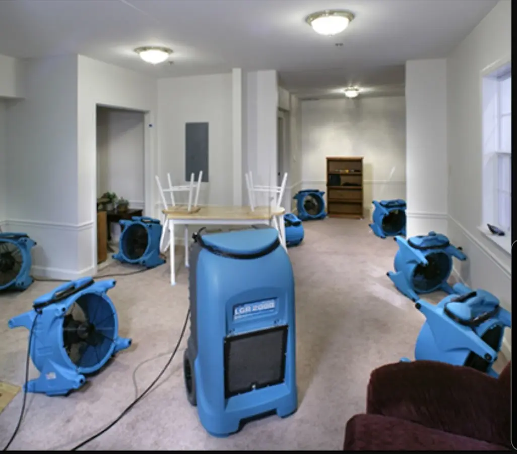 Air movers and dehumidifier setup for Water Damage Restoration in Woodhaven
